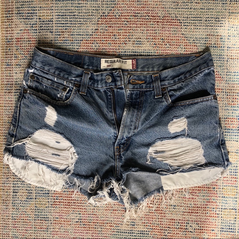 Levi’s high waisted distressed jean shorts